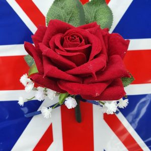 Buttonhole flower red rose with white flowers on union jack