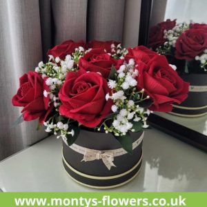Artificial red rose and gypsophila hat box